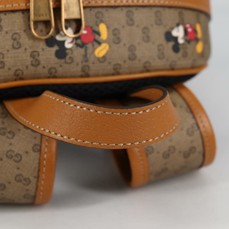 【日本直送】GUCCI GUCCIxDisney GG Supreme 雙肩包 PVC 米金色 552884 正品 140648M-6