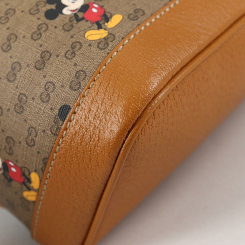 【日本直送】GUCCI GUCCIxDisney GG Supreme 雙肩包 PVC 米金色 552884 正品 140648M-15