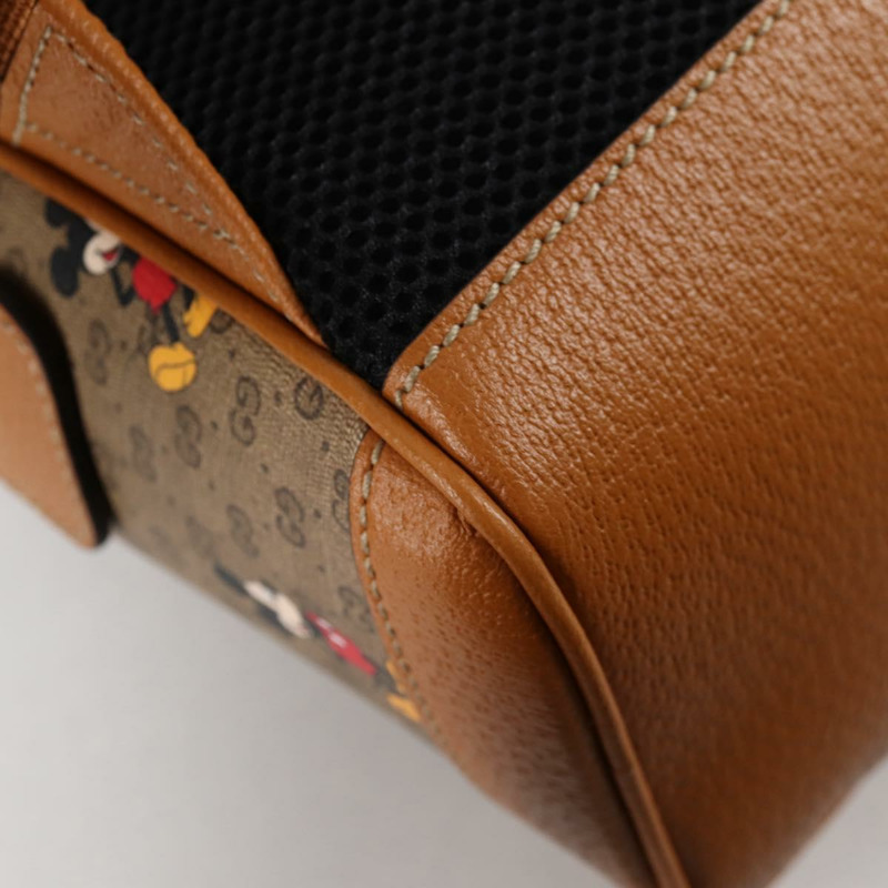 【日本直送】GUCCI GUCCIxDisney GG Supreme 雙肩包 PVC 米金色 552884 正品 140648M-17