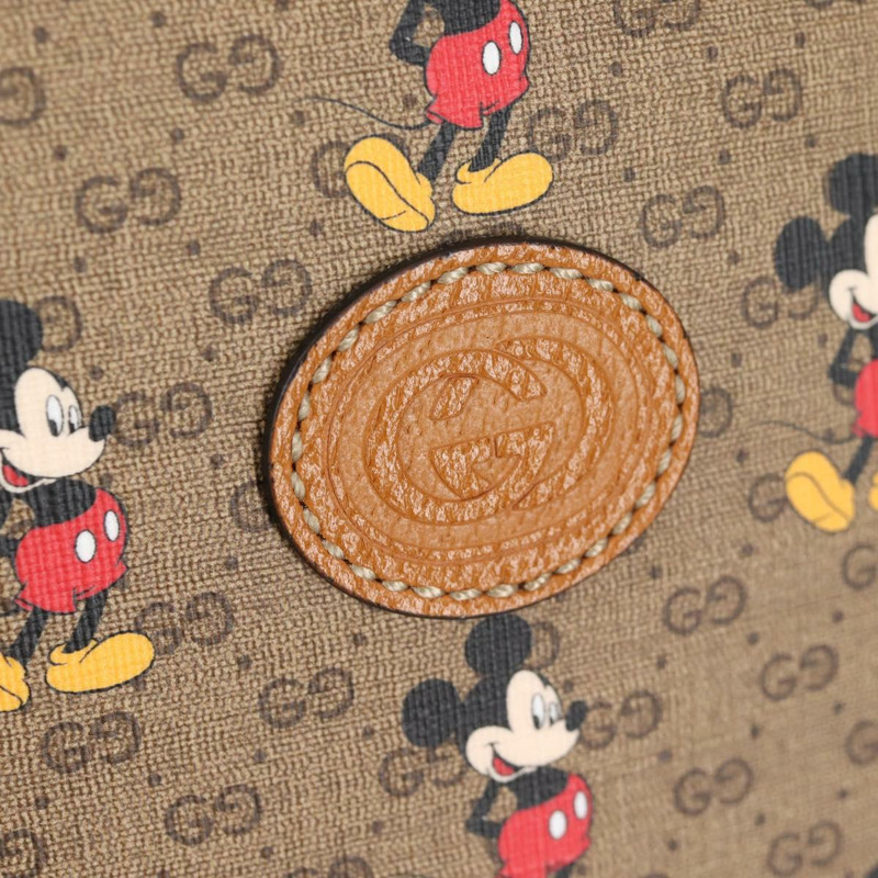 【日本直送】GUCCI GUCCIxDisney GG Supreme 雙肩包 PVC 米金色 552884 正品 140648M-19