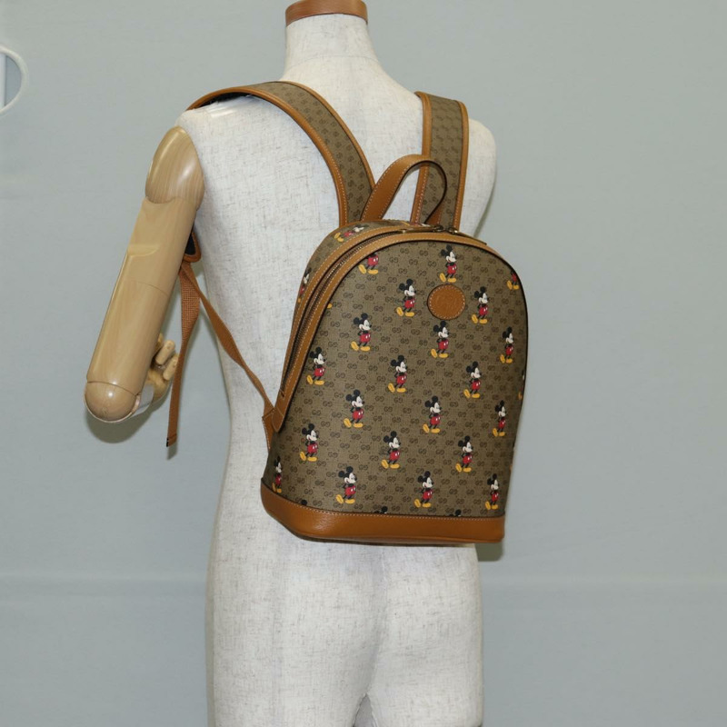【日本直送】GUCCI GUCCIxDisney GG Supreme 雙肩包 PVC 米金色 552884 正品 140648M-26