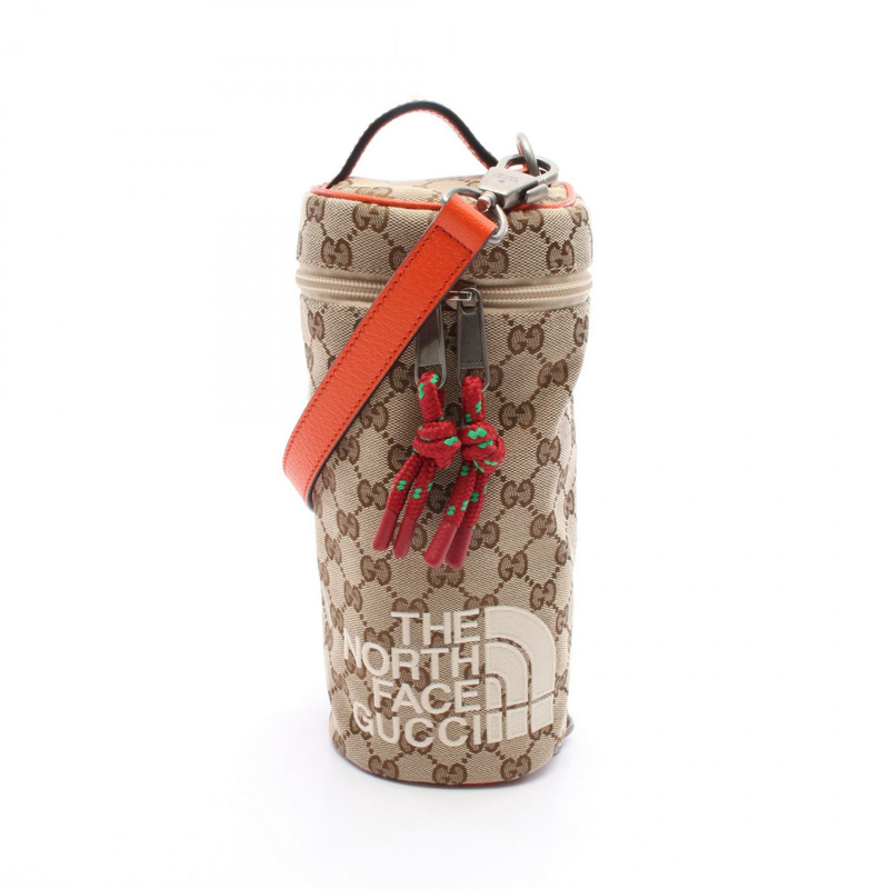 GUCCI×THE NORTH FACE GG帆布斜背肩背包 679760 公尺棕色-0