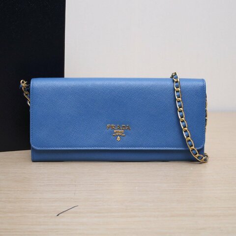 PRADA 藍色牛皮woc肩背包