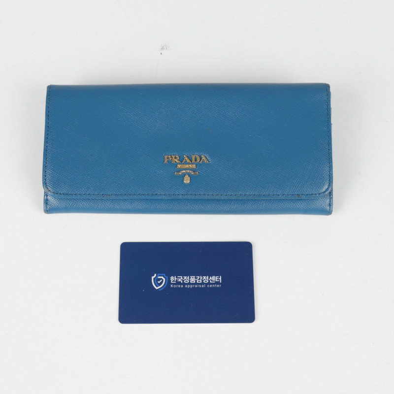 PRADA 金屬標誌長皮夾 1M1132-8