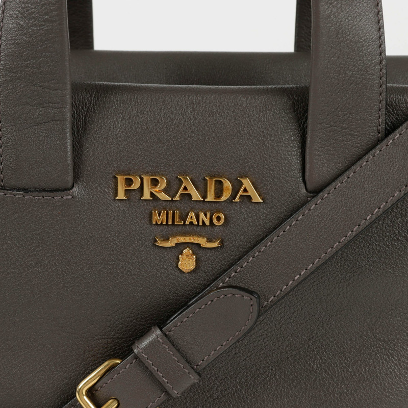 PRADA 金屬標誌托特單肩包 1BA344-1