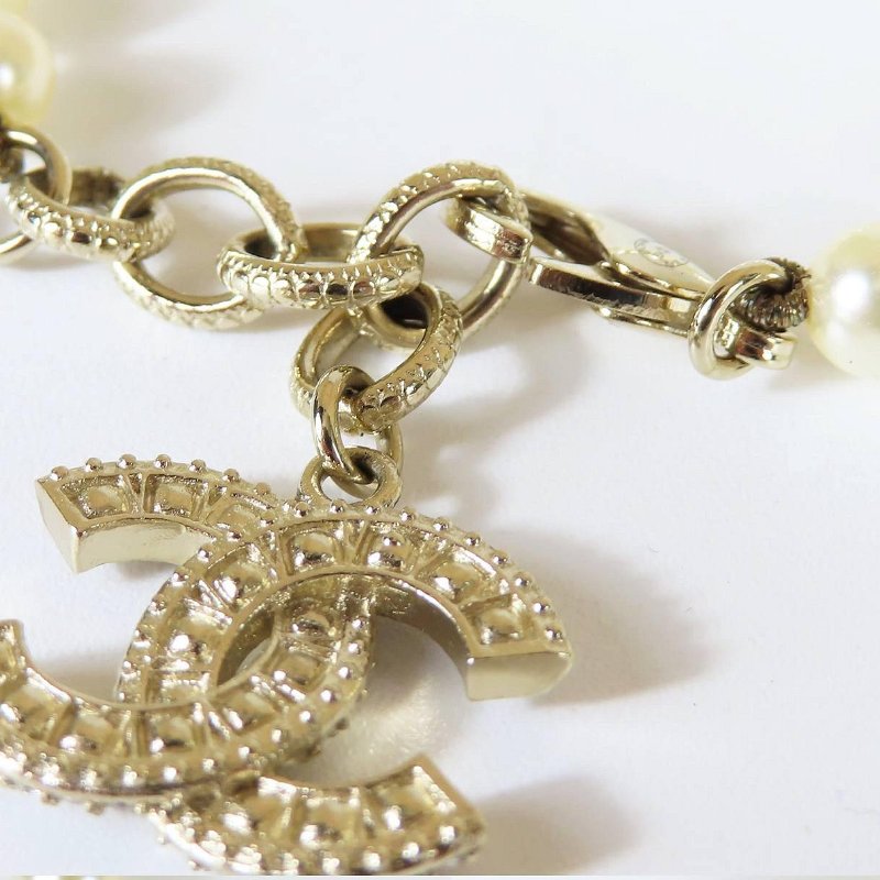 【巴黎站二手名牌專賣店】*現貨*CHANEL 香奈兒 真品*淡金色鑲鑽雙C吊墜珍珠手鍊-1