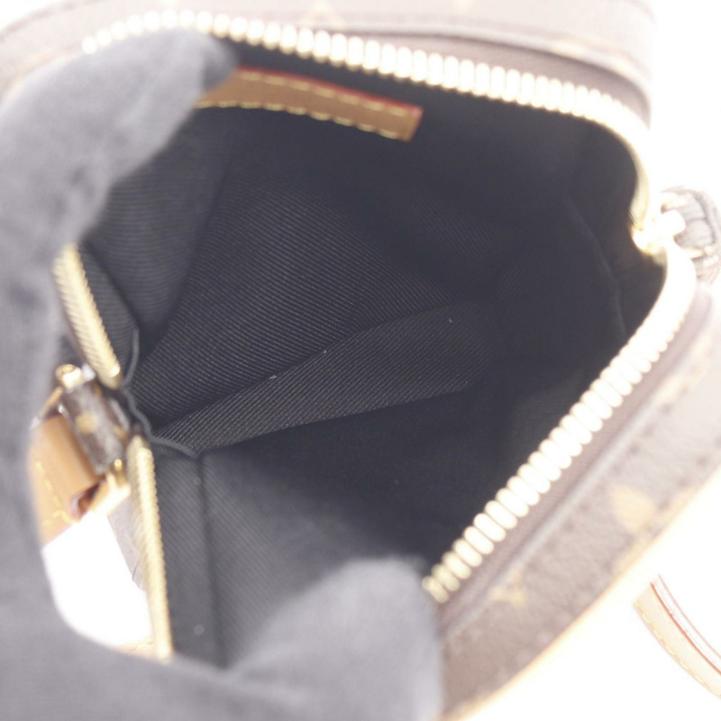 Louis Vuitton 音樂播放器可穿戴錢包 Monogram 單肩包，採用塗層帆布和皮革製成，棕色，女士，M14063-2