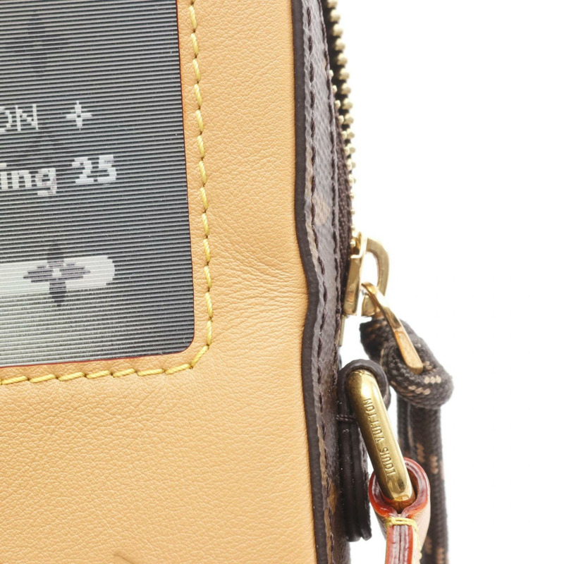Louis Vuitton 音樂播放器可穿戴錢包 Monogram 單肩包，採用塗層帆布和皮革製成，棕色，女士，M14063-5