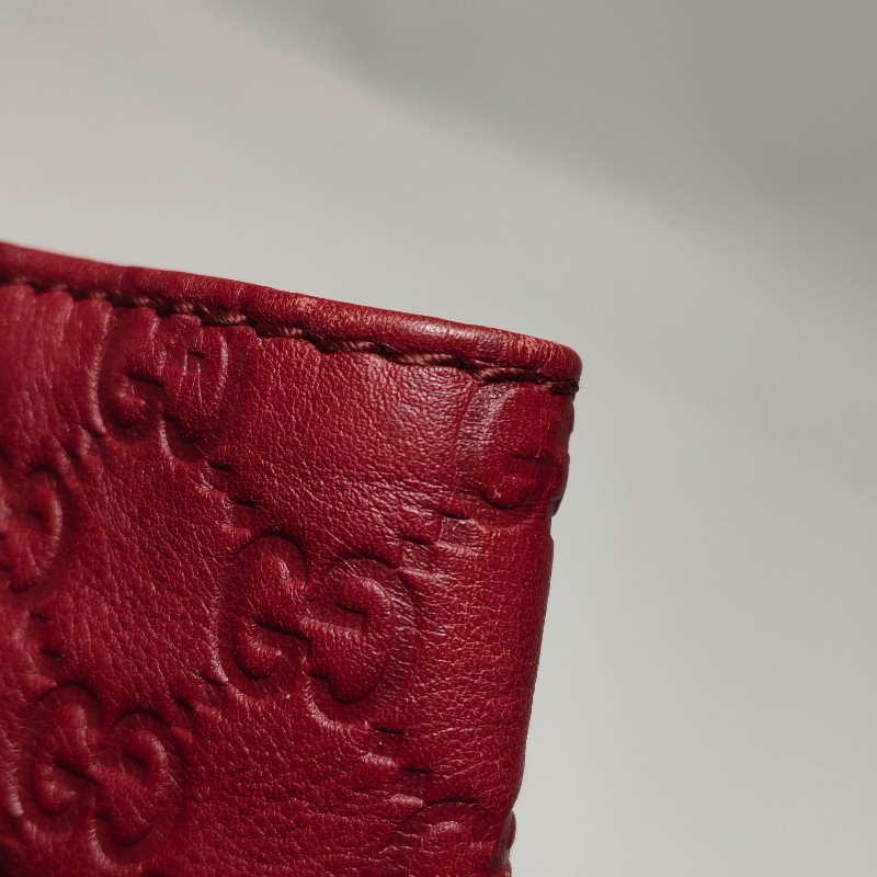 Gucci 牛皮純色雙G老花壓紋手提包-14