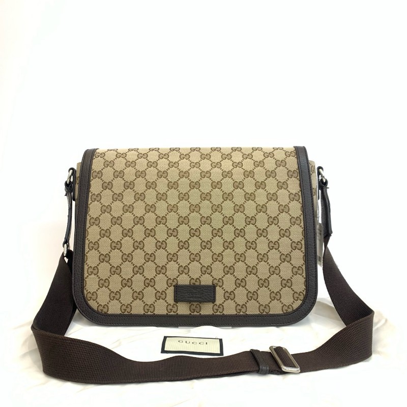 Gucci/古馳棕色老花郵差包黑 底長31㎝。-0