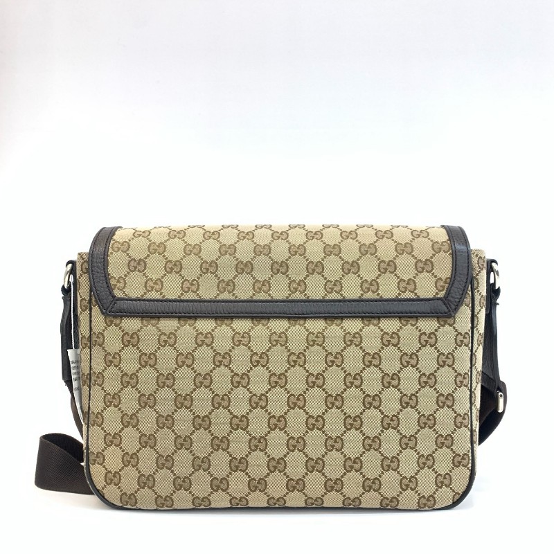 Gucci/古馳棕色老花郵差包黑 底長31㎝。-1