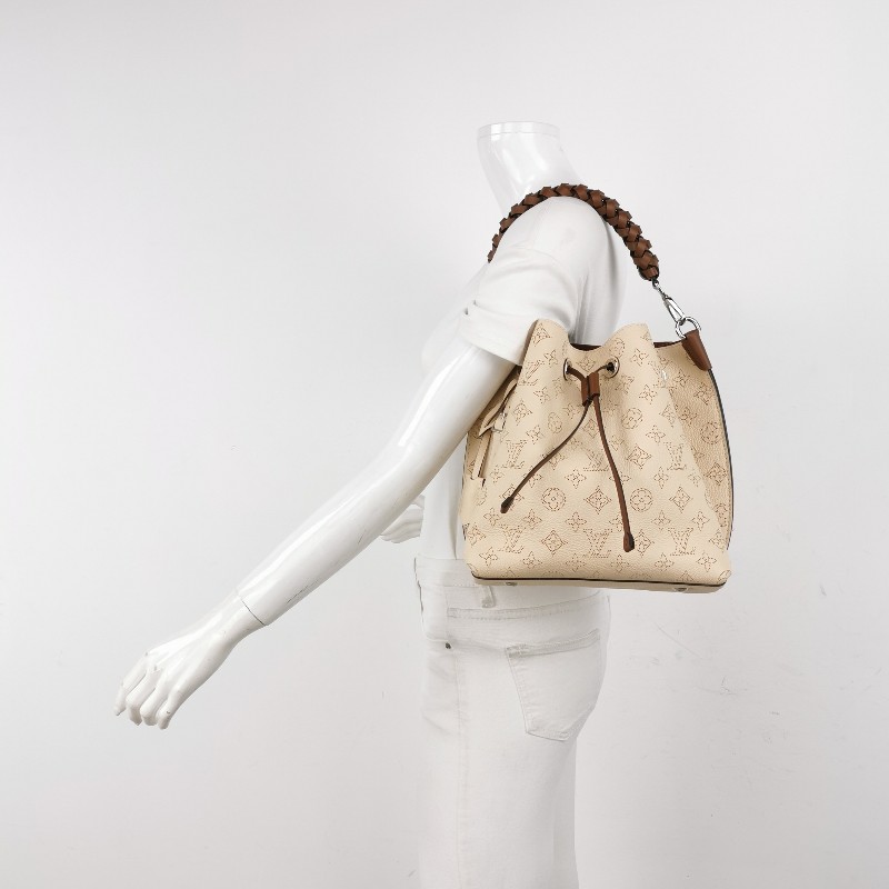 Louis Vuitton (LV) Muria牛皮鏤空Monogram 印花抽繩單肩包手提包晶片款-1