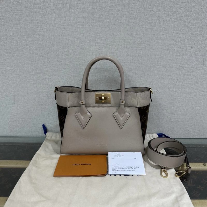 LV on my side金扣手提斜背包 25*19*12 99新配件塵袋購證-0