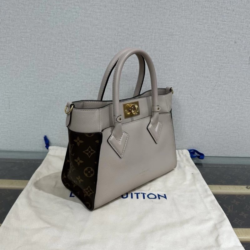 LV on my side金扣手提斜背包 25*19*12 99新配件塵袋購證-1