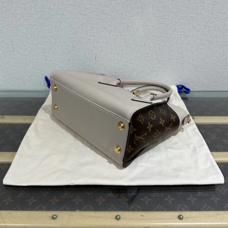 LV on my side金扣手提斜背包 25*19*12 99新配件塵袋購證-4