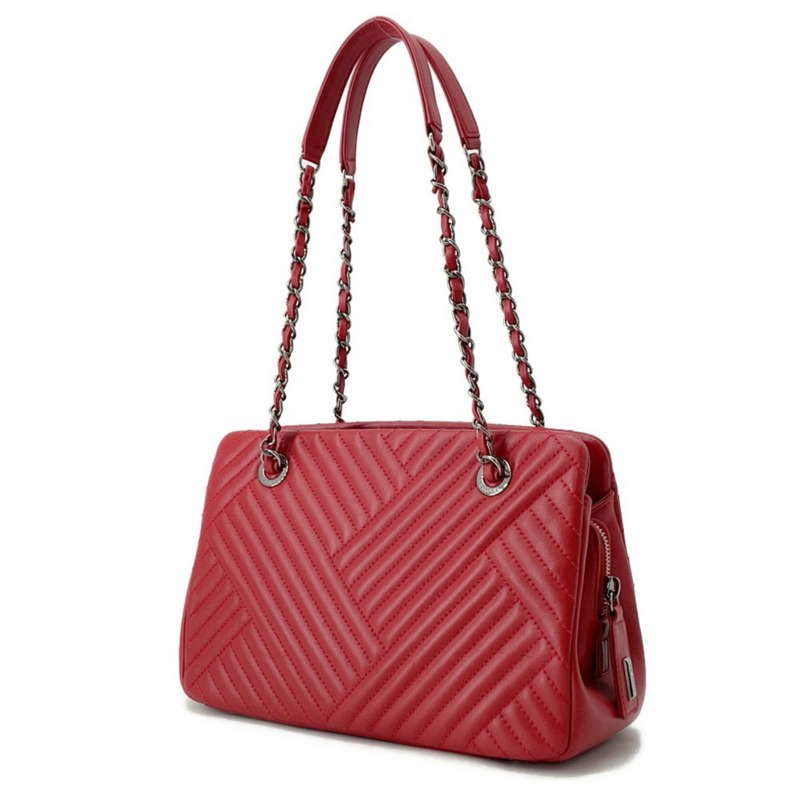 香奈兒鏈條手提包，飾有Coco標誌、人字紋和羊皮V形縫線-1