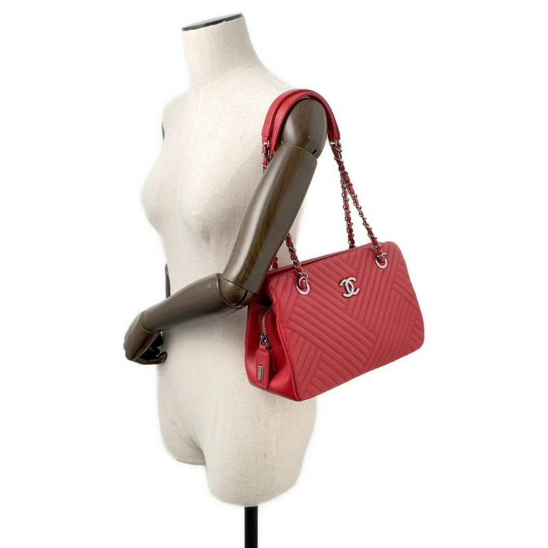 香奈兒鏈條手提包，飾有Coco標誌、人字紋和羊皮V形縫線-3