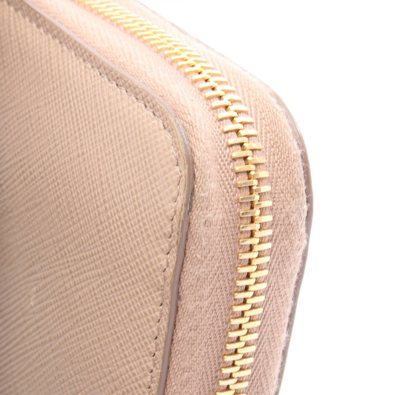 PRADA 粉紅女士拉鍊長皮夾,Saffiano 皮革材質,二手。-8