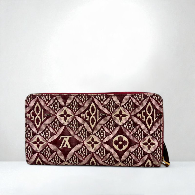 LV皮夾  Since1854紅白緹花ㄇ拉長夾M69994-3