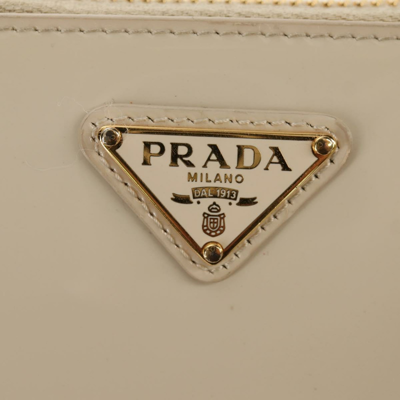 【日本直送】PRADA 三角迷你琺瑯兩用手拿包 象牙金 1NR015 正品 147726M-16