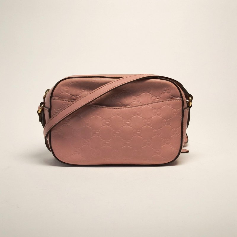 GUCCI 粉色牛皮經典老花GG壓紋相機包肩背包-0