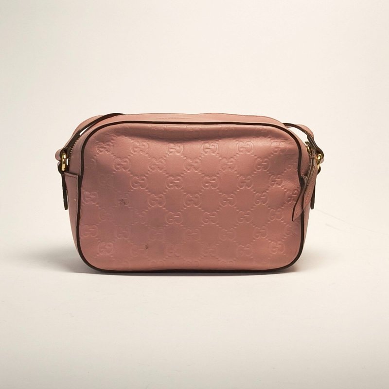 GUCCI 粉色牛皮經典老花GG壓紋相機包肩背包-1