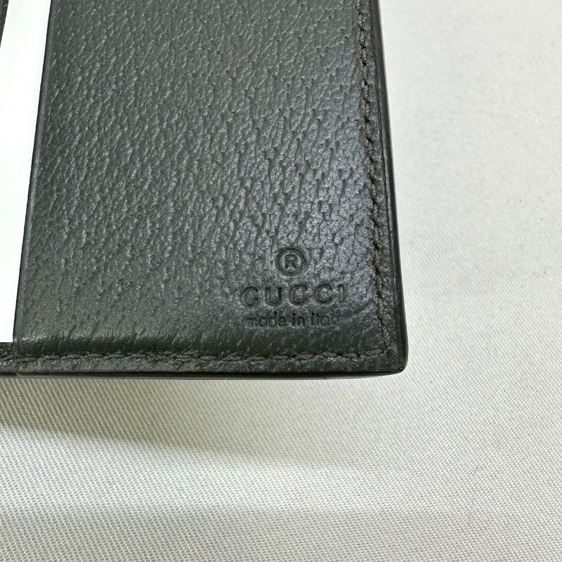 GUCCI 黑灰老花二摺短夾-6
