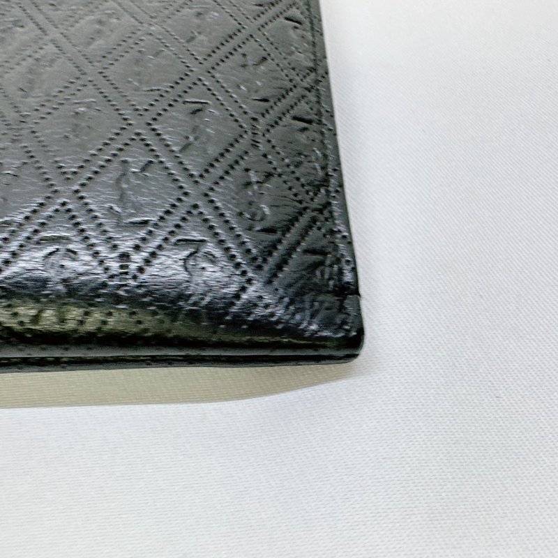 YSL 滿版Logo牛皮壓紋手拿包-12