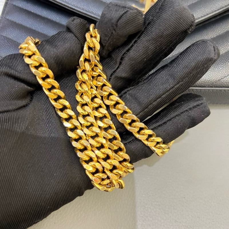 YSL 黑金魚子醬woc信封包-7