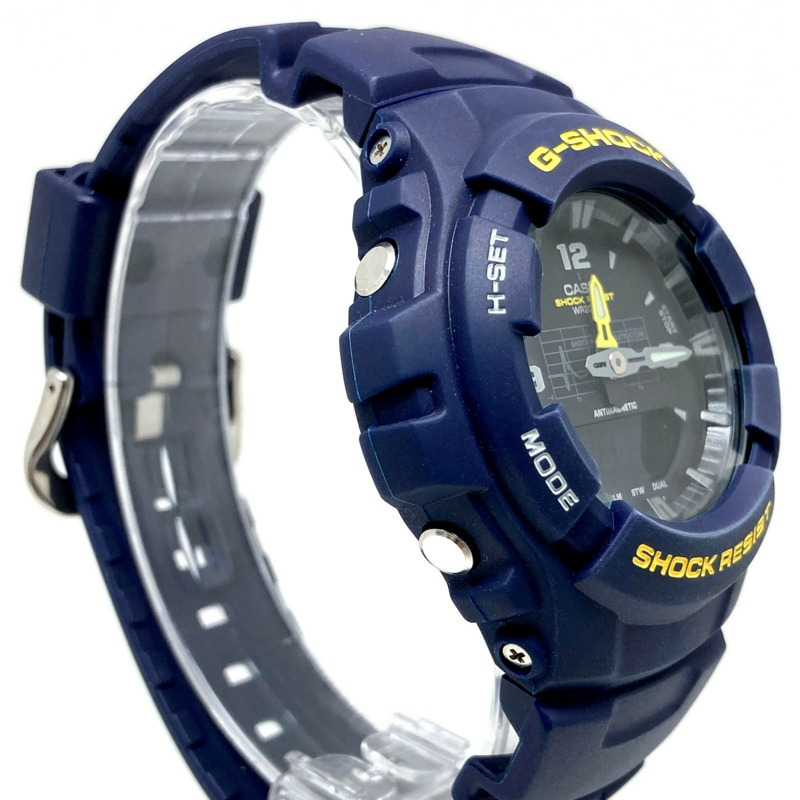卡西歐 G-SHOCK G-100-2BM 海軍藍腕錶，附避震曲線，黃色錶盤，指針/數位雙顯，2000 年 2 月發布，Mikunigaoka 商店，IT3NKDIWG4-2