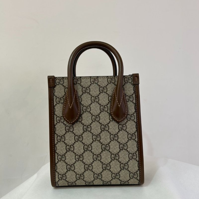 GUCCI 咖邊PVC琴譜包INTERLOCKING-1