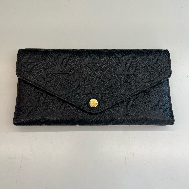 LV黑色全皮壓紋長夾錢包-0