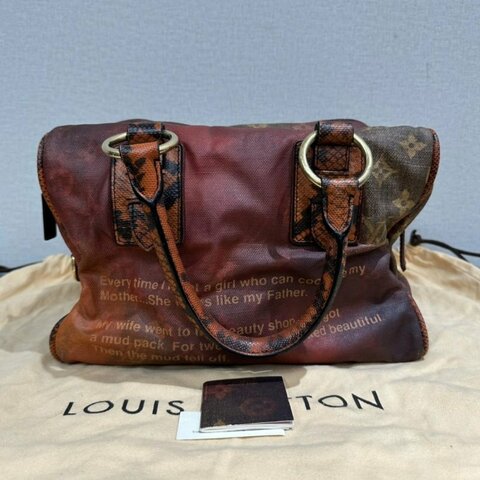 LV 紅色金扣拼稀有皮限量秀款手提包 30*24*24 98新配件塵袋