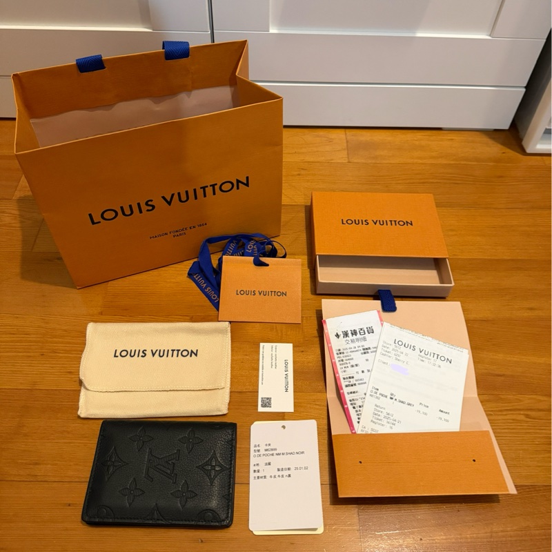 Louis Vuitton LV 袋裝萬用錢包 卡夾 M62899 黑色壓紋 皮革 小牛皮(近全新)-0