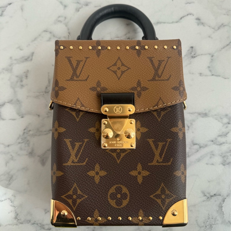 LV M82465雙花紋直立手提兩用包-1