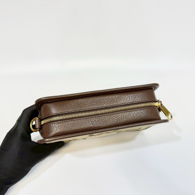 GUCCI原花帆布拚皮革JUMBO GG拉鍊相機包696075-8