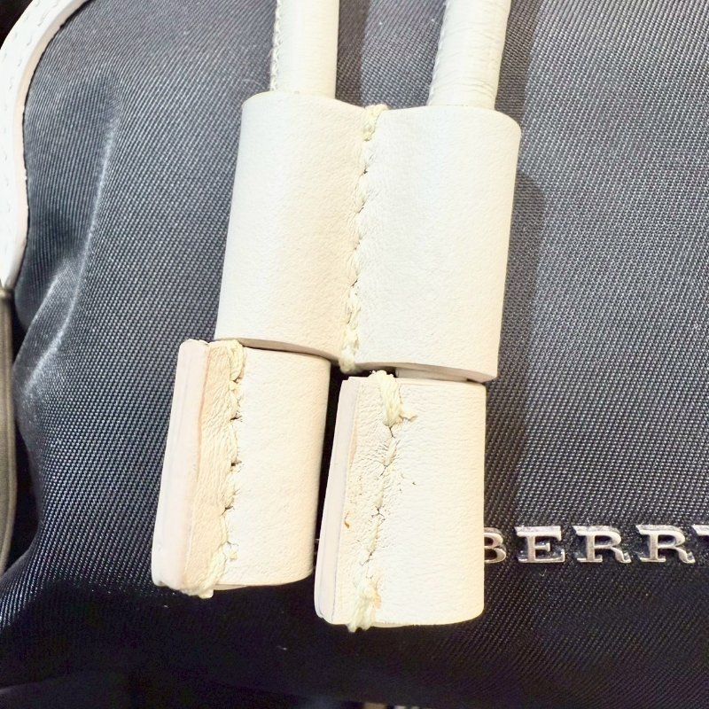 BURBERRY黑拚白邊尼龍戰馬格紋雙肩後背包4080196-9