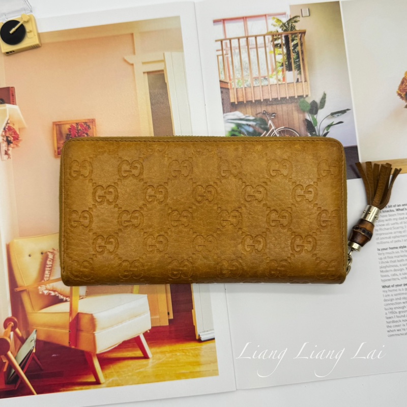 GUCCI 古馳 雙G壓紋竹節流蘇拉鏈棕色長夾-1