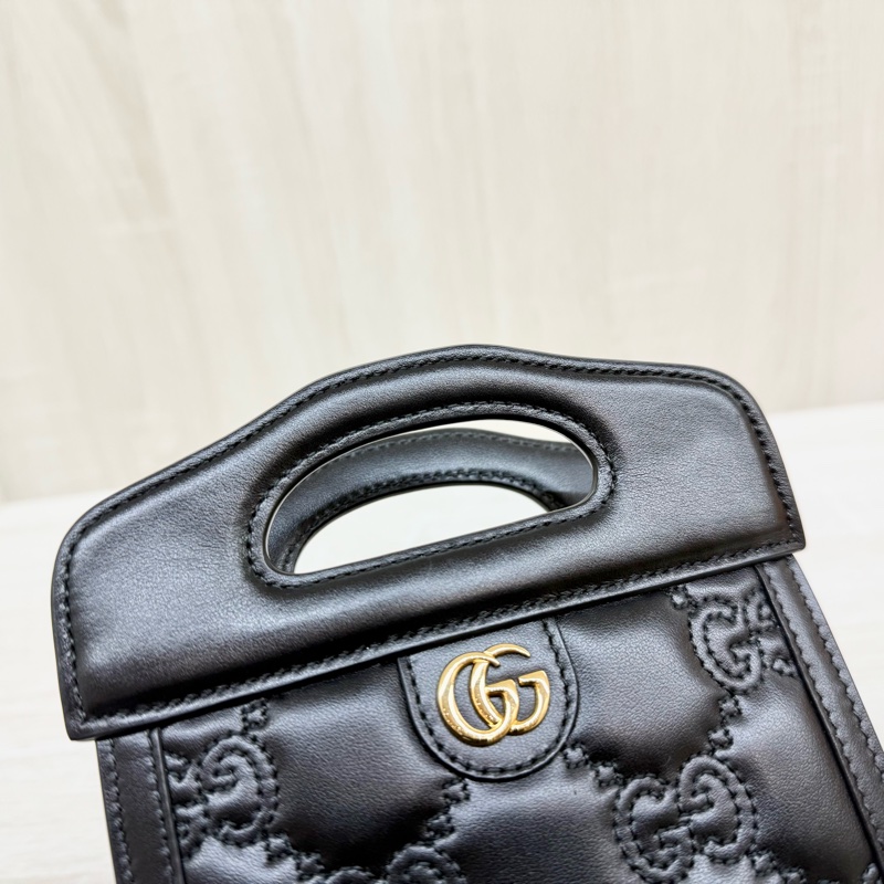 GUCCI黑金牛皮壓紋縫線直立手機包723776-10