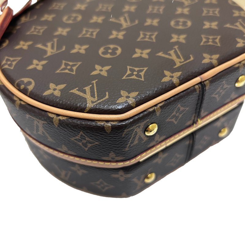 LV字紋硬殼圓餅提背二用包-5