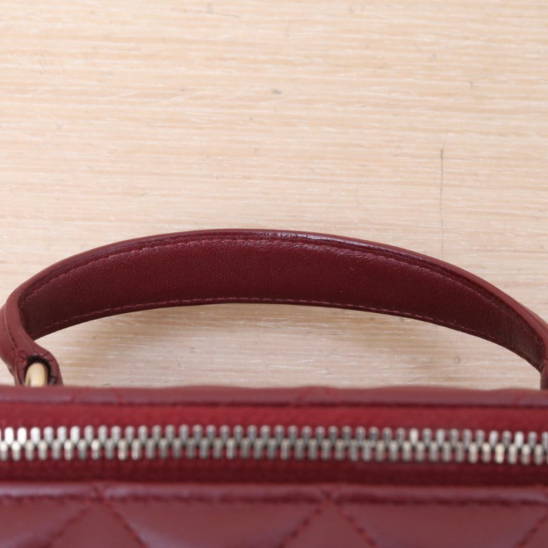 CHANEL 21A長盒子化妝包無鏡子17酒紅色羊皮31開金扣皮手柄肩背包-2