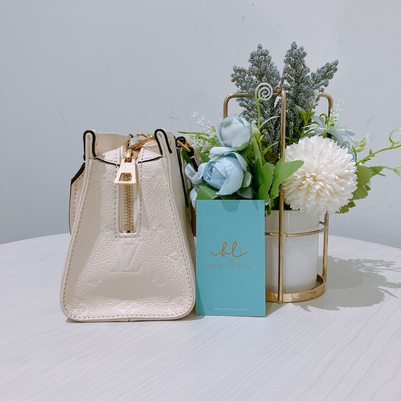 TK1886 Louis Vuitton 路易威登奶昔白手提/斜挎包On The Go East West Monogram Empreinte Cream X GHW-3