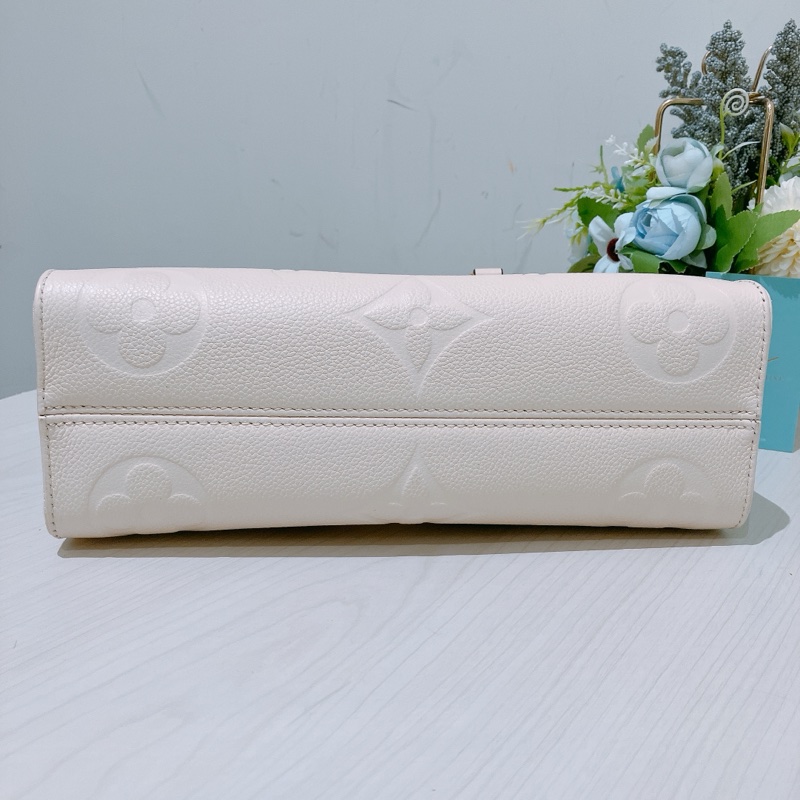 TK1886 Louis Vuitton 路易威登奶昔白手提/斜挎包On The Go East West Monogram Empreinte Cream X GHW-4
