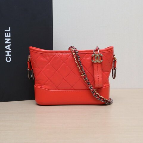 CHANEL GABRIELLE流浪小號20橘色牛皮27開金銀扣肩背包