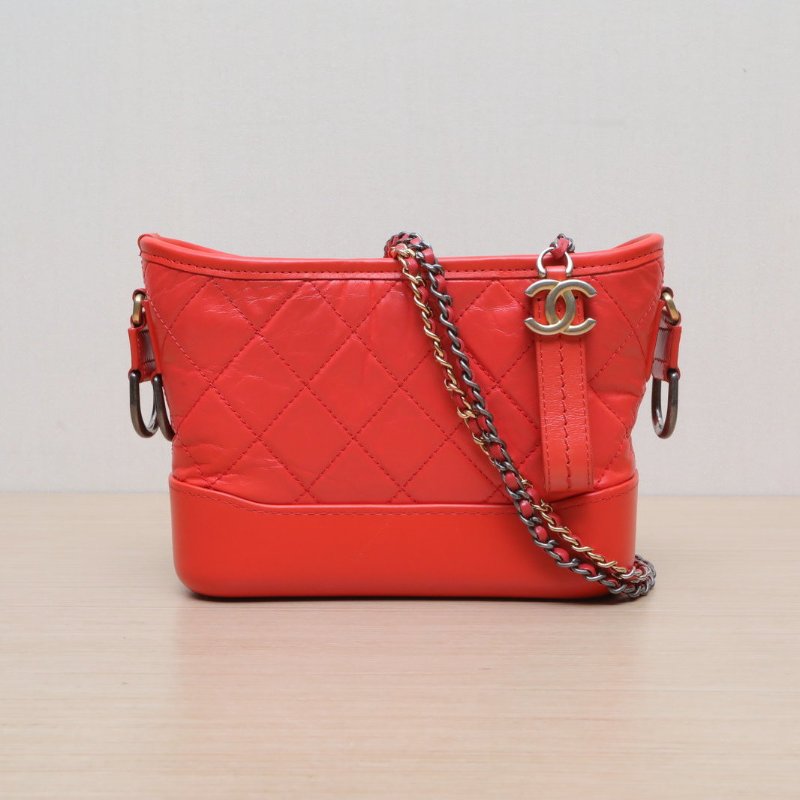 CHANEL GABRIELLE流浪小號20橘色牛皮27開金銀扣肩背包-1
