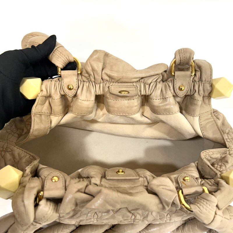 LV奶茶抓皺牛皮辮子肩背包-6