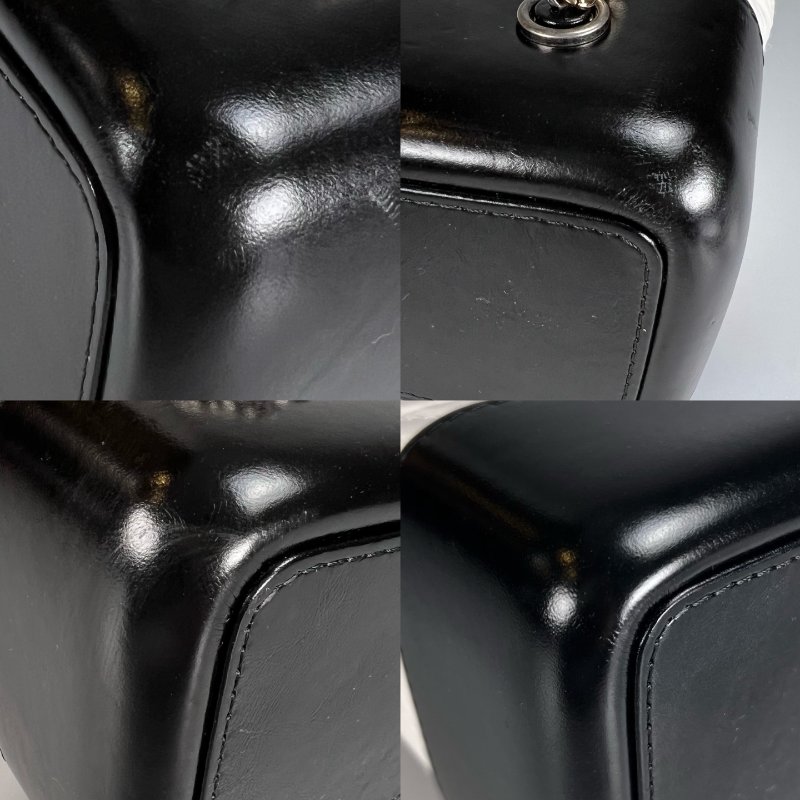 CHANEL 24開 黑白流浪後背包-10