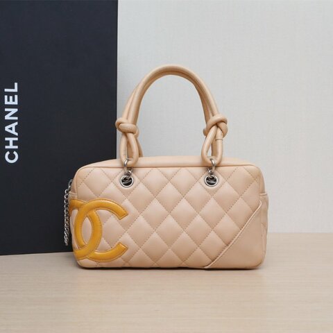 CHANEL 橘色牛皮10開銀扣中古康鵬枕頭包mini單肩包肩背包