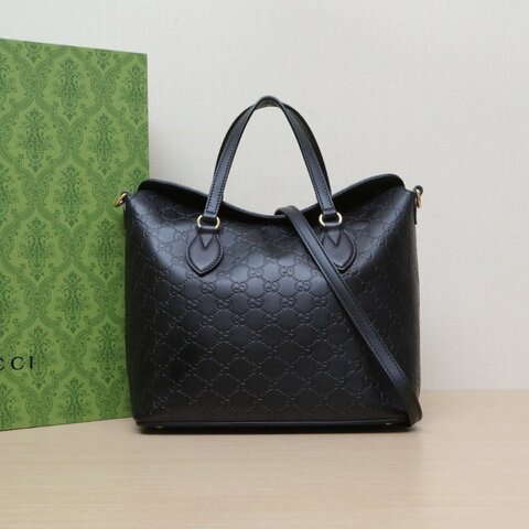 GUCCI 黑色牛皮金扣GG壓紋斜挎包肩背包