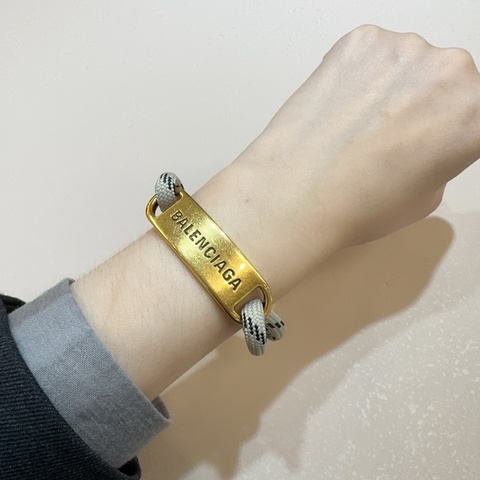 BALENCIAGA金牌LOGO灰黑繩結手環656418